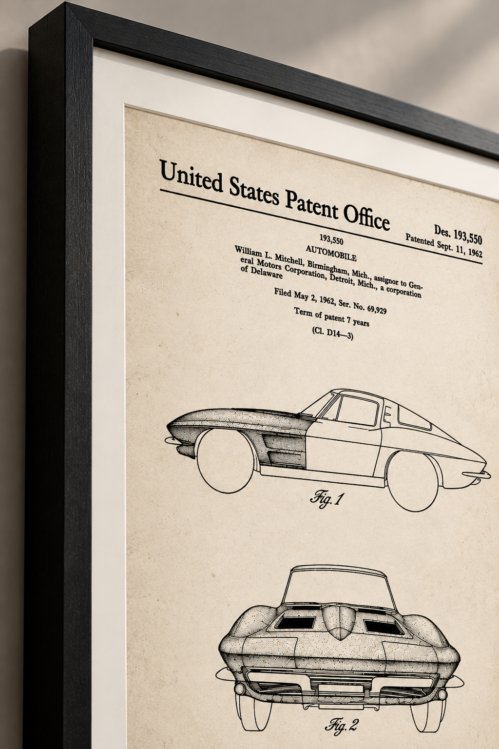 Classic Corvette Sting Ray Automotive Blueprint Wall Art Angled close-up of framed 1962 Corvette Sting Ray automotive patent artwork showing the black frame and historic vehicle drawings